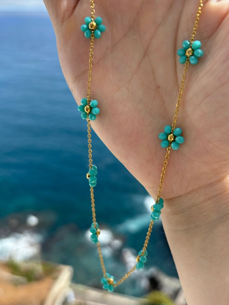 Trendy Ketting Bloom van stainless steel – kleurrijk ontwerp, verkrijgbaar in turquoise, wit, roze, en donkerblauw, perfect met Bloom armbanden