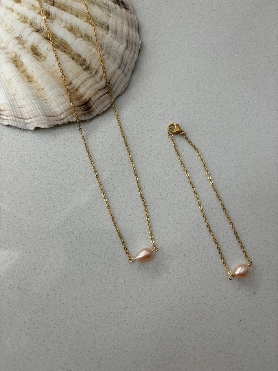 Trendy Pearl Hartjes Ketting en Armband van stainless steel – elegant met parel hartjes, verkrijgbaar in goud en zilver