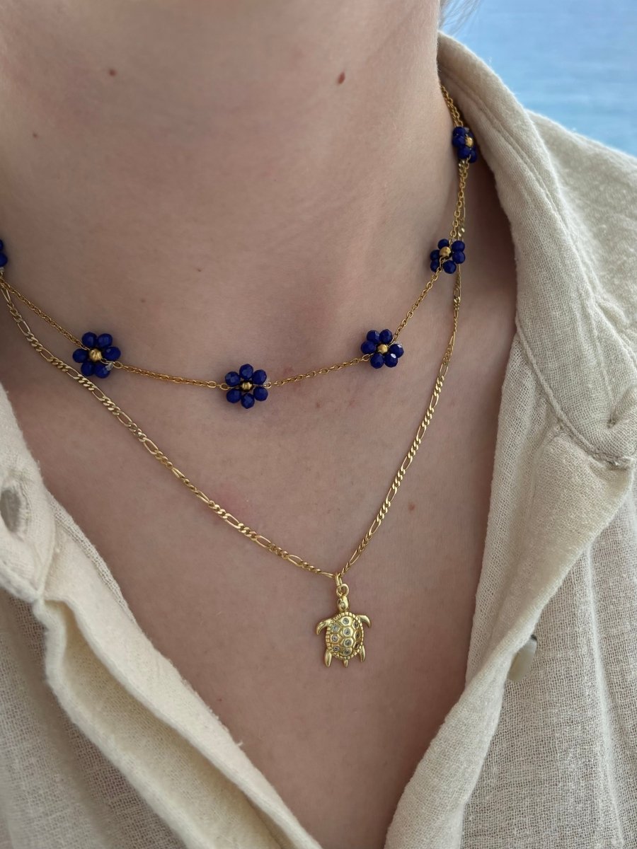 Trendy Ketting Bloom van stainless steel – kleurrijk ontwerp, verkrijgbaar in turquoise, wit, roze, en donkerblauw, perfect met Bloom armbanden